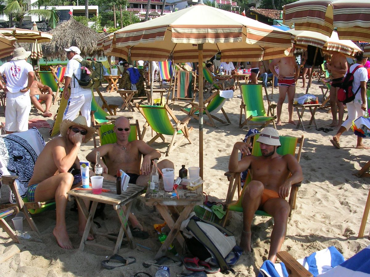 Gay Beach at Playa los Muertos: Several beach clubs, Blue Chairs and Green Chairs, make for a festive scene at the beach